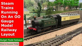 Steam Trains Running On An OO Gauge Model Railway Layout