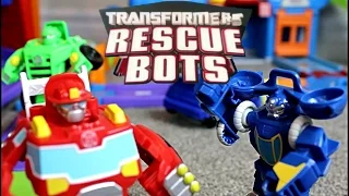 RESCUE BOTS vs. BATBOT in Smart Wheels City featuring Giant Heatwave