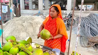 Beautiful Village Woman Cutting Green Coconut In City। The Street & Food