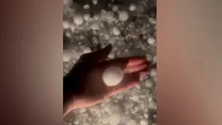 Hail damages cars in Needville