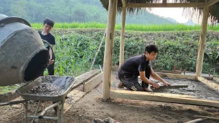 The orphan boy drove a tractor to transport sand and mix it with cement strips make the foundation