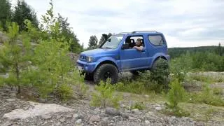 Suzuki Jimny on 33's "Crawling"