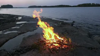 Campfire on rocky beach