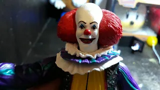 NECA Pennywise 1990s IT the movie action figure.