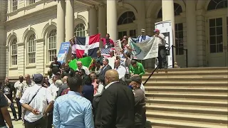 Rally held for bodega worker charged in fatal stabbing