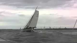 Trimaran Dragonfly 32 overtaking a fast 50' monohull