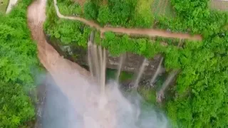 Spectacular waterfalls form from flooding in Chongqing