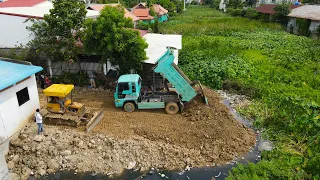 Stunning View Technique Filling Stone into Deep Bad Water by Operator Bulldozer Spreading Stone