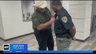 Video shows Ellis County Sheriff Brad Norman cutting patch off fired deputy