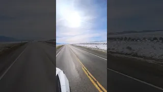 Driving a Tesla on Scenic Highway 285 in Colorado