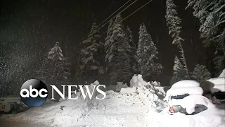 Snow pummels storm-battered California