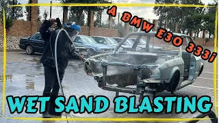 Wet sand blasting a BMW E30 333i.