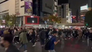 Japanees supporters celebrate the 2-1 stunning win over Germany in Qatar 2022