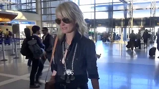 Laeticia Hallyday Lets Her Hair Down, Ditches Bra For Solo Flight To Paris