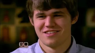 Magnus Carlsen will to win and smiling at the opponent!