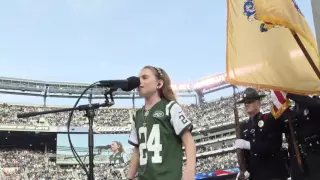 Brianna Collichio singing at a Jets game