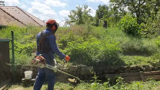 Mowing the basement roof with the stihl fs-460 mower.