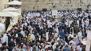 Thousands attend Passover priestly blessing at Western Wall (wailing wall) in tense Jerusalem. 2022