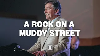 A Rock on a Muddy Street | Carter Conlon