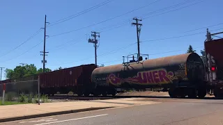 Caught a westbound 2187 CN train with weird horn (Washington ave Lansing Reo Town)