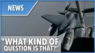 F-15 pilots kill time while refueling