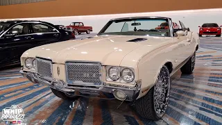 Oldsmobile Cutlass Vert on 26" Chrome Asanti Wheels with Matching Steering Wheel at MEM Auto Expo