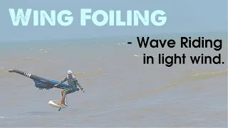 WING FOILING : Riding Waves in light side on shore wind.