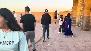 Walking by Castelo Real de Mogado at sunset in Essaouira, Morocco