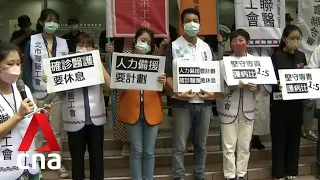 COVID-19: Taiwan's medical facilities and workers struggle to cope with growing cases