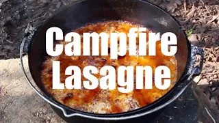 Dutch Oven Lasagne Cooked Over an Open Fire.  Cast Iron Cooking.  Baker Tent.