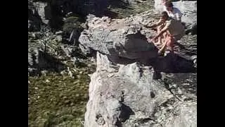 Pushing a Rock off a Cliff