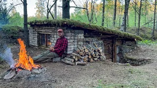 Building a long term shelter in forest from an old abandoned bunker. Bushcraft in the wild forest!