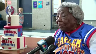 109-year-old celebrates with famous basketball team