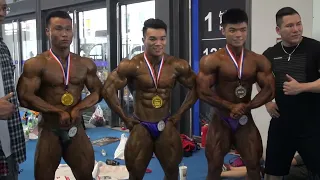China colleague bodybuilder backstage, tanning & pumping