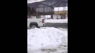 Kids riding there Atv in the snow