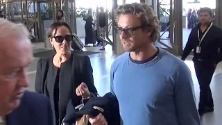 Simon Baker And Rebecca Rigg Jet Out Of LAX Sans Kids