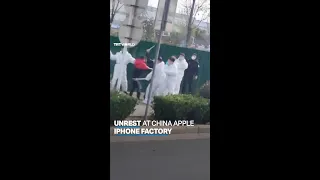 China Apple factory workers clash with security personnel