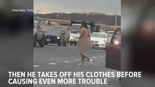 Caught on camera: Man strips naked in bizarre road rage incident