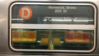 On board a Coney Island bound R68 D train from Norwood–205 Street to Coney Island-Stillwell Avenue