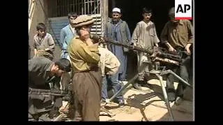 Repair shops in northern Afghanistan fixing weapons.