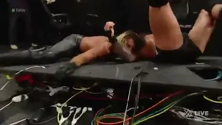 Randy Orton rko on Seth Rollins through Announce table