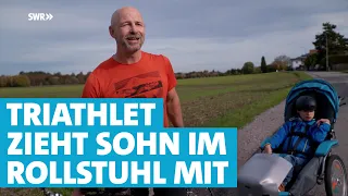 Triathlon trotz schwerer Behinderung: Vater nimmt Sohn im Anhänger mit