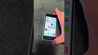 White iPhone 5c on its launch iOS!