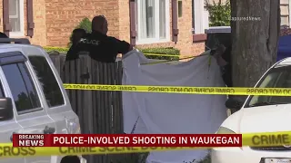 Armed man with gas can taped to chest fatally shot by officer in Waukegan, police say