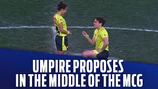 Umpire proposes to another umpire in the middle of the MCG | AFL