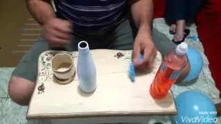 Encapando garrafa com bexiga