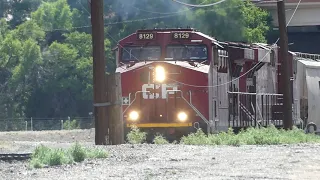 CP #8129 & #8752 lead a freight train out of the Pueblo Yard