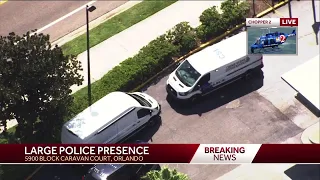 Large police presence in Orlando connected to manhunt for suspects who shot officers