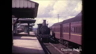 3096 arrives, runs around its train, then departs a bucolic Campbelltown, in 1960.