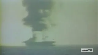 USS Ommaney Bay (CVE-79) burns after kamikaze attack - 4 January 1945